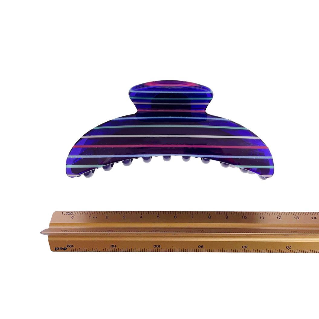 Meet ANNA!  A curved classic shape hair claw with double grip finish. The curved design makes it perfect for that all up look, and with the teeth being close together the grip works to hold all hair, from fine to thick.  Each clip comes in a branded Tort pouch (colours change seasonally).  Size: 12cm  Colour: navy blue with electric multi-colour stripes  Material: eco-resin