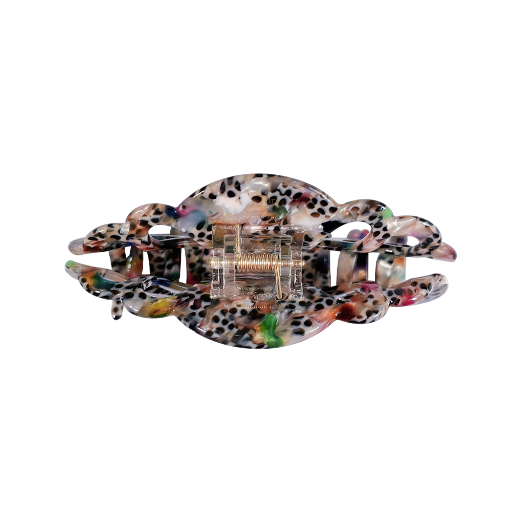 Meet ELLI!  
A marbled camouflage brown and teal resin hair claw with scalloped edges. With a strong grip, this claw works on all hair, including thick hair.  Each clip comes in a branded Tort pouch (colours change seasonally).  Size: 10cm  Colour: multi-marble mixed with leopard print  Material: eco-resin