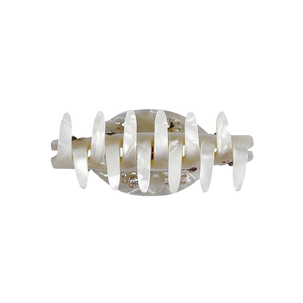 Meet RANA!  A medium to large silhouette claw in a half moon shape with rhinestone accents. The solid shape and close teeth, create a strong grip, making it great for fine hair and thick hair.  Each clip comes in a branded Tort pouch (colours change seasonally).  Size: 7.5cm  Colour: ivory pearl with crystal jewels and silver studs  Material: eco-resin