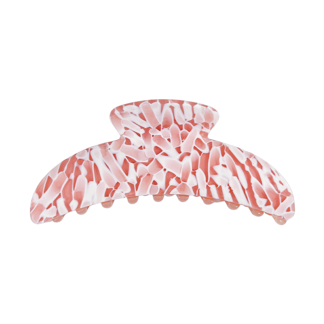 Meet ANNA!  A curved classic shape hair claw with double grip finish. The curved design makes it perfect for that all up look, and with the teeth being close together the grip works to hold all hair, from fine to thick.  Each clip comes in a branded Tort pouch (colours change seasonally).  Size: 12cm  Colour: peach and white mosaic-like pattern  Material: eco-resin