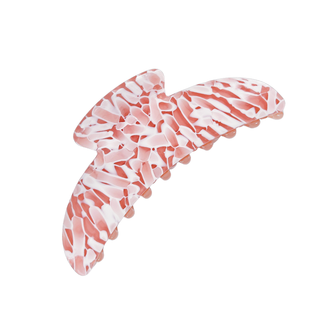 Meet ANNA!  A curved classic shape hair claw with double grip finish. The curved design makes it perfect for that all up look, and with the teeth being close together the grip works to hold all hair, from fine to thick.  Each clip comes in a branded Tort pouch (colours change seasonally).  Size: 12cm  Colour: peach and white mosaic-like pattern  Material: eco-resin