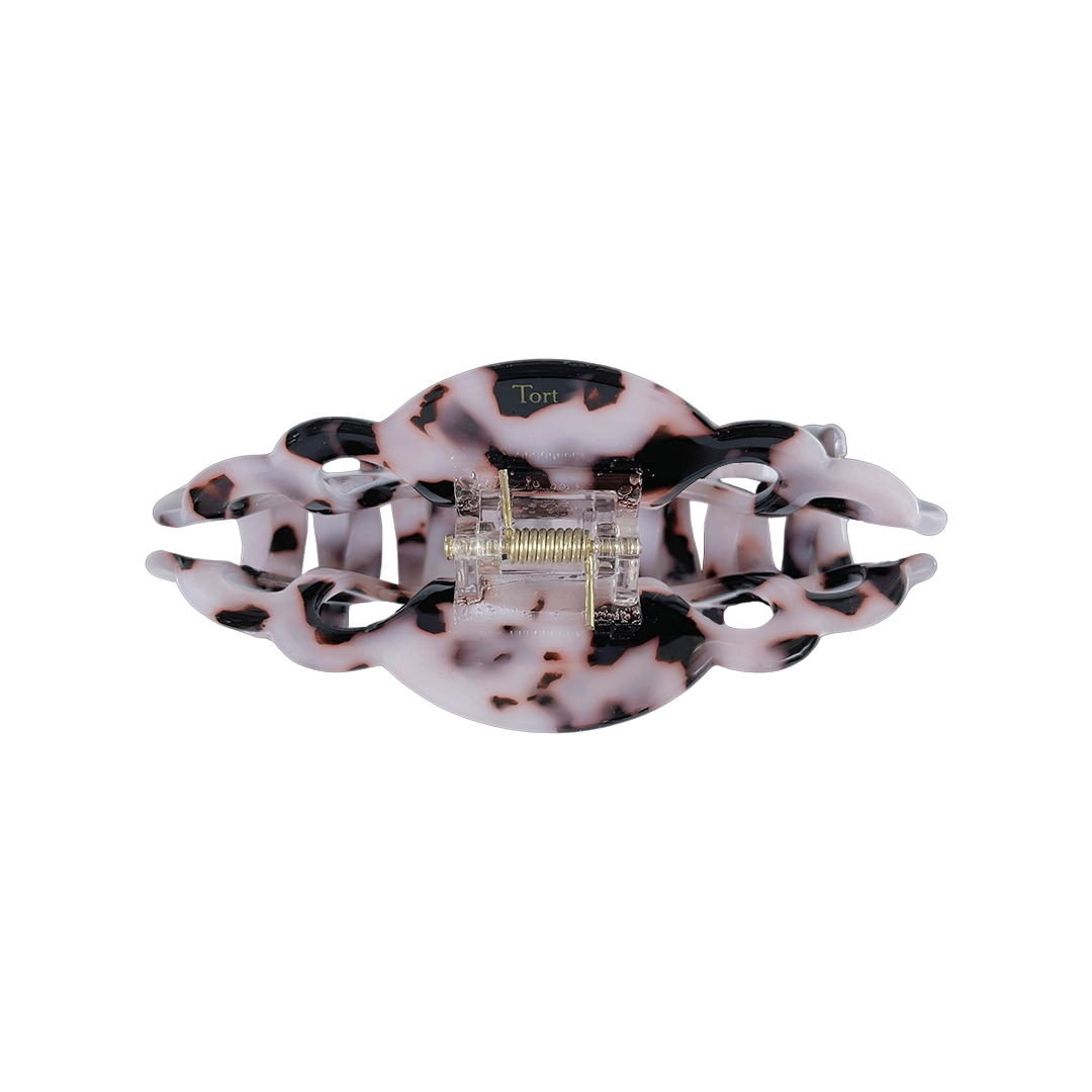Meet ELLI!    A medium sized hair claw with scalloped edges and a strong grip. This claw works on all hair, including thick hair.  Each clip comes in a branded Tort pouch (colours change seasonally).  Size: 10cm  Colour: cloudy white-lilac and black leopard-like pattern  Material: eco-resin