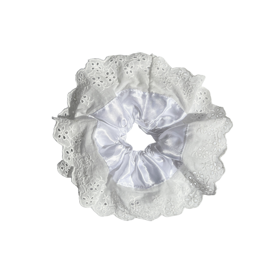 Meet LOLA!  A scrunchie big enough to hold all hair. Two layers of broderie anglaise makes it perfect for an all up look on both fine and thicker hair, or great for securing a bun. The silky centre is kinder to the hair, especially if being worn overnight.   Each scrunchie comes with a pink ribbon tag on which can be used as a gift tag.  Size: approx 18cm  Colour: white lace with a white silk centre  Material: Cotton and Satin