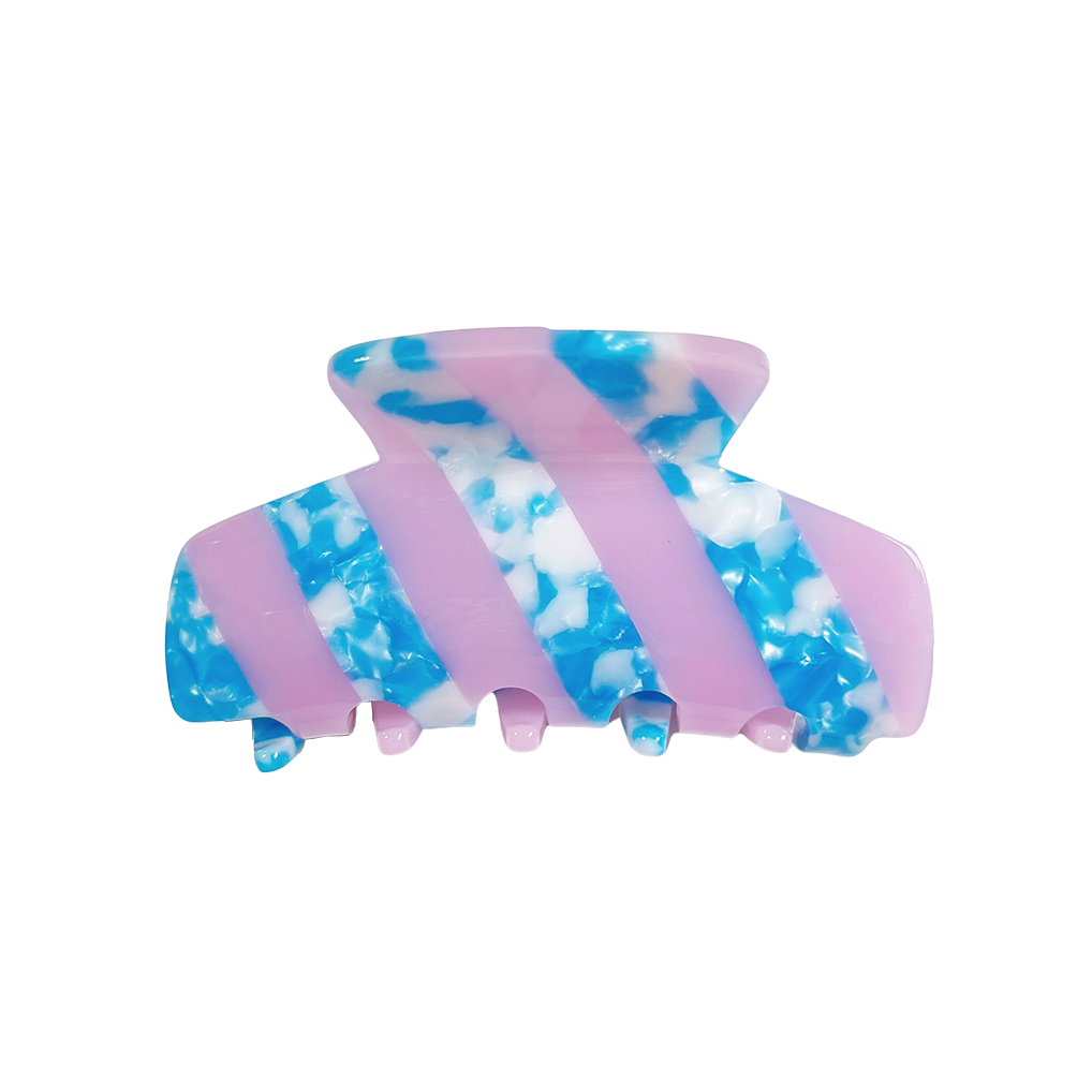 Meet LORA!  A medium sized silhouette claw in our signature stripes. Two resin patterns are merged together to create a colour combinations of dreams. The medium size makes it very easy to use and perfect for an all up look or securing a bun. For shorter hair it can be used for an all up look.  Each clip comes in a branded Tort pouch (colours change seasonally).  Size: 9cm  Colour: blush lilac with blue and white cloud effect stripe  Material: eco-resin