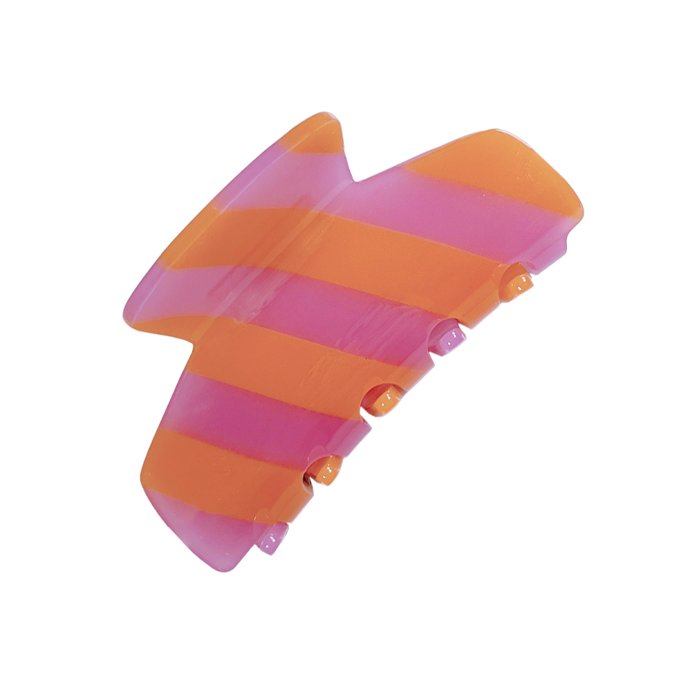 Meet LORA!  A medium sized silhouette claw in our signature stripes. Two resin patterns are merged together to create a colour combinations of dreams. The medium size makes it very easy to use and perfect for an all up look or securing a bun. For shorter hair it can be used for an all up look.  Each clip comes in a branded Tort pouch (colours change seasonally).  Size: 9cm  Colour: hot and peach-pink stripe  Material: eco-resin