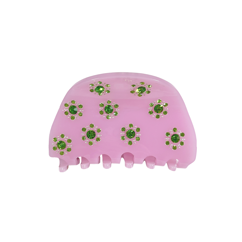 Meet RANA!  A medium to large silhouette claw in a half moon shape with rhinestone accents. The solid shape and close teeth, create a strong grip, making it great for fine hair and thick hair.  Each clip comes in a branded Tort pouch (colours change seasonally).  Size: 7.5cm  Colour: raspberry-lilac with peridot jewels and silver studs  Material: eco-resin