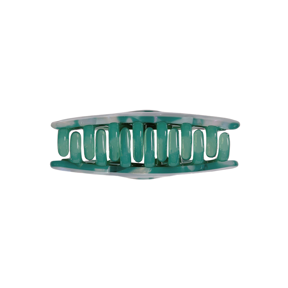 Meet TOTO!  One of our strongest clips in a classic curved top claw shape. Don’t let the small size fool you, as one of our strongest hair claws it works hard to hold all hair, even that difficult fine hair that slips out of clips.  Each clip comes in a branded Tort pouch (colours change seasonally).  Size: 7.5cm  Colour: teal green and pearlescent white with subtle iridescent pieces  Material: eco-resin