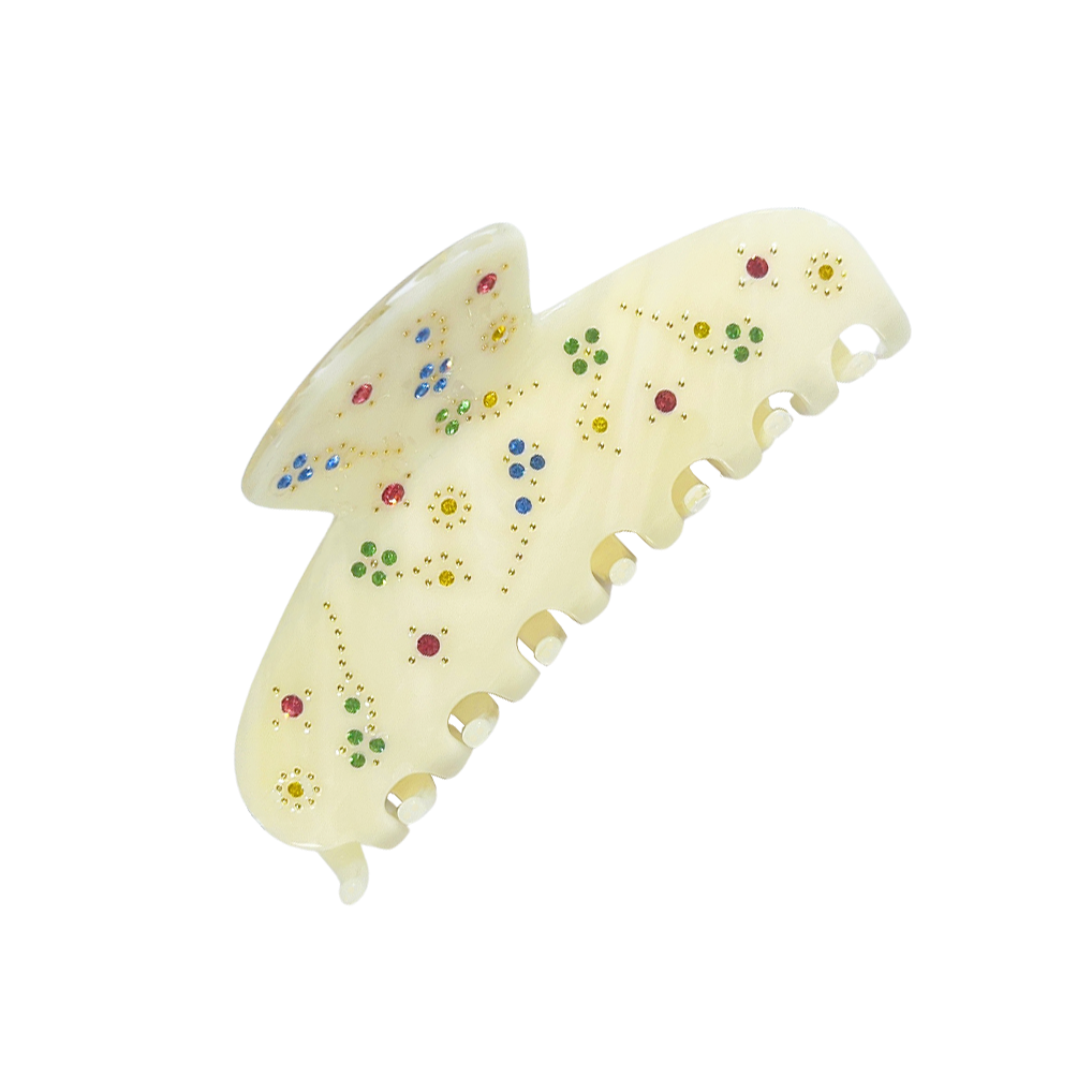 Meet YARA!  A medium-large slimmer silhouette shaped hair claw with rhinestone and delicate stud detail. The shorter close together teeth allow for it to hold even fine hair in place.  Each clip comes in a branded Tort pouch (colours change seasonally).  Size: 10cm  Colour: pastel lemon with rose pink, light blue, green and yellow jewels and gold studs  Material: eco-resin