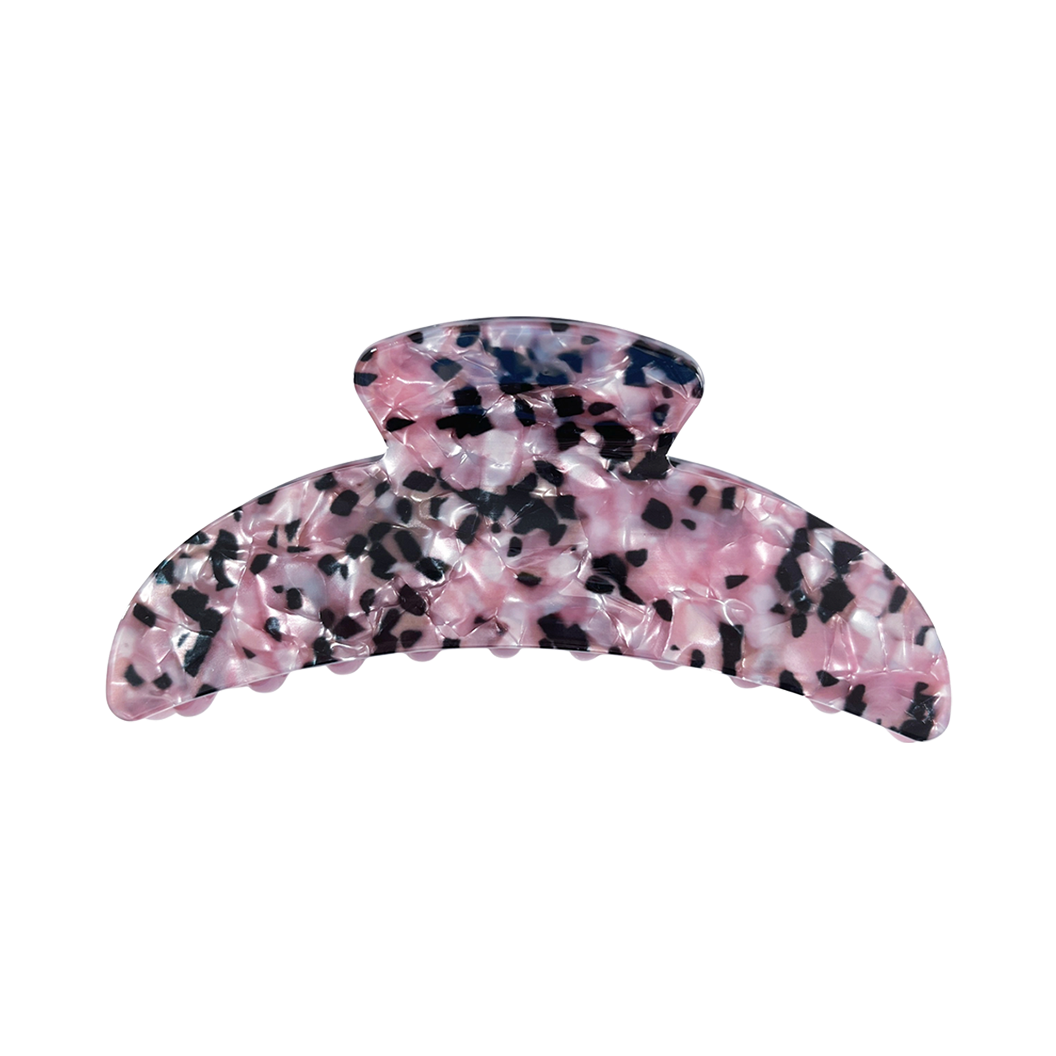 Meet ANNA!  A curved classic shape hair claw with double grip finish. The curved design makes it perfect for that all up look, and with the teeth being close together the grip works to hold all hair, from fine to thick.  Each clip comes in a branded Tort pouch (colours change seasonally).  Size: 12cm  Colour: pearlescent purple-pink with black panther-like pattern  Material: eco-resin