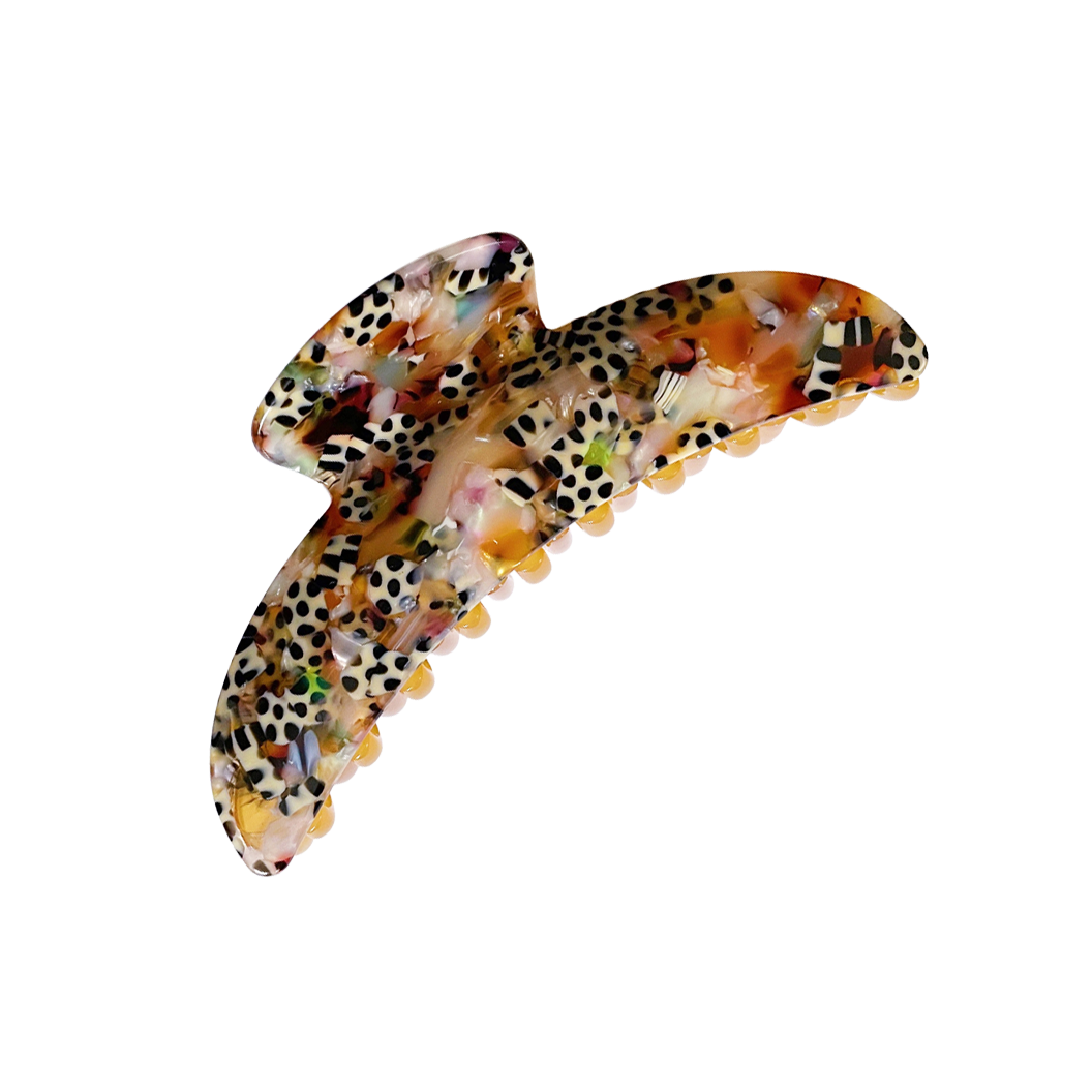 Meet ANNA!  A curved classic shape hair claw with double grip finish. The curved design makes it perfect for that all up look, and with the teeth being close together the grip works to hold all hair, from fine to thick.  Each clip comes in a branded Tort pouch (colours change seasonally).  Size: 12cm  Colour: multi-marble mixed with leopard print  Material: eco-resin