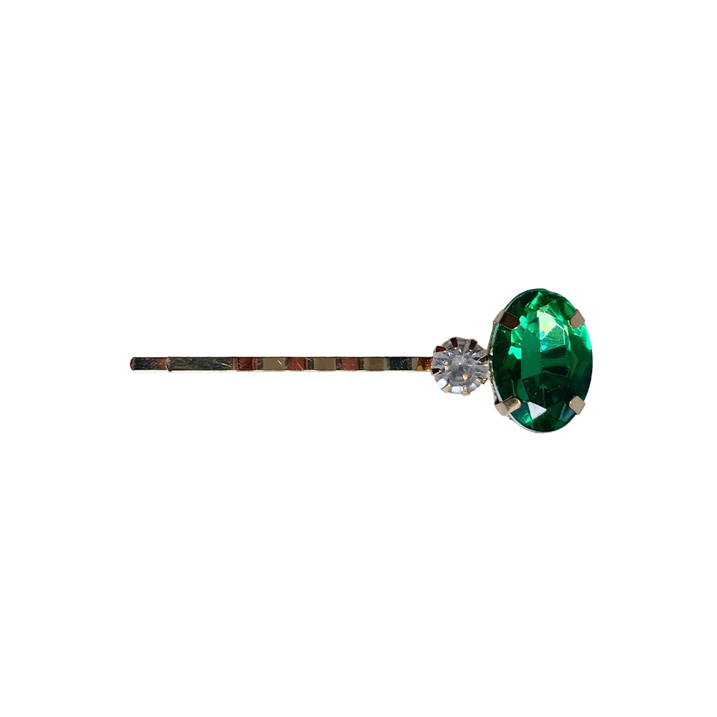 Meet BETH!  An oval emerald cut next to a smaller clear crystal design, on a gold-brass hair slide. The smaller hair slide ensures a secure fit and hold on most hair types, even fine hair.  Each clip comes in a branded Tort pouch (colours change seasonally).  Size: 6cm  Colour: emerald green and crystal  Material: hand crafted glass beads