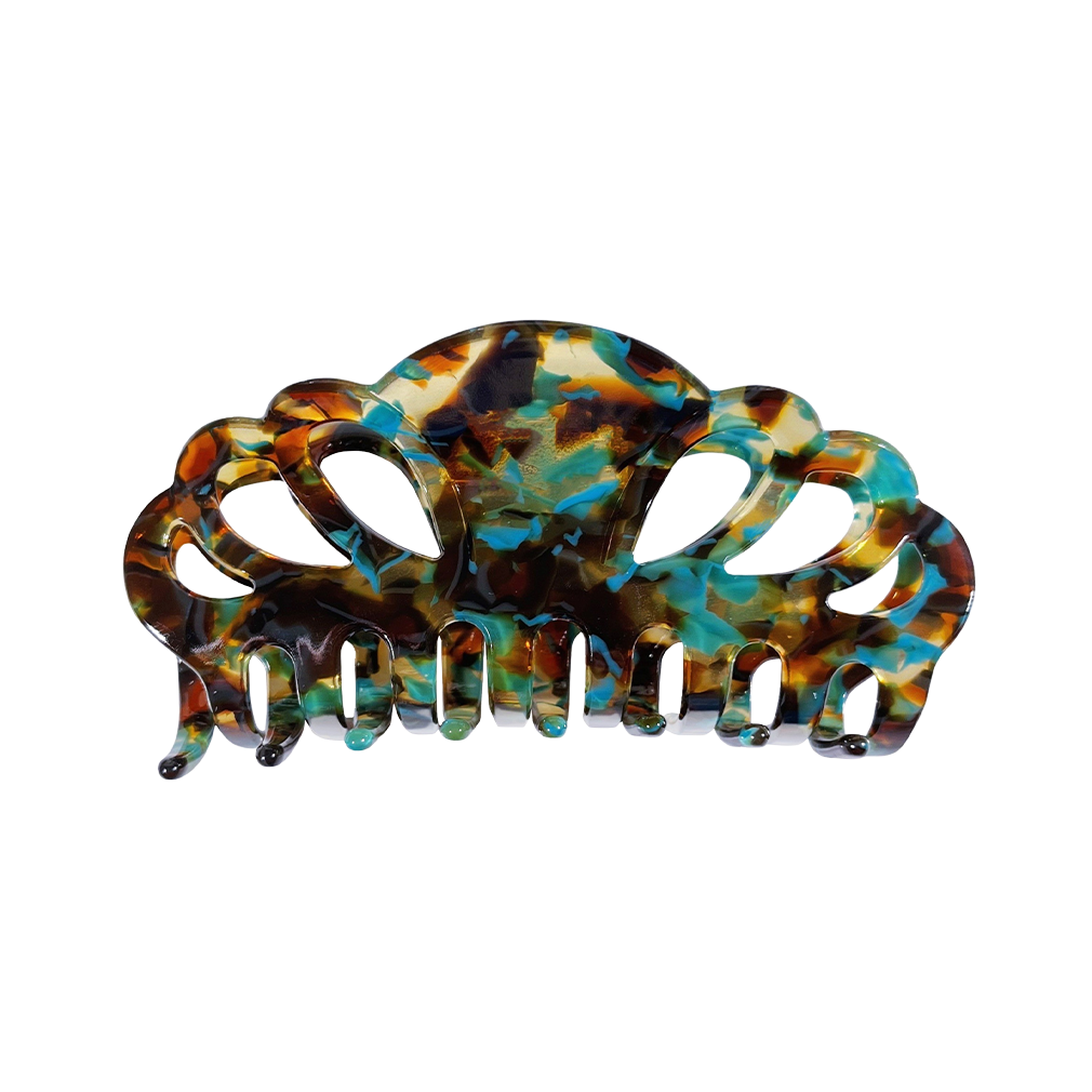 Meet ELLI!    A marbled camouflage brown and teal resin hair claw with scalloped edges. With a strong grip, this claw works on all hair, including thick hair.  Each clip comes in a branded Tort pouch (colours change seasonally).  Size: 10cm  Colour: brown and teal marbled camouflage  Material: eco-resin