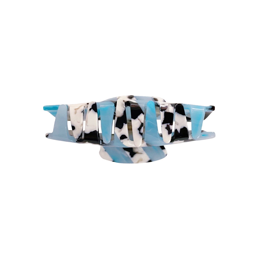 Meet LORA!  A medium sized silhouette claw in our signature stripes. Two resin patterns are merged together to create a colour combinations of dreams. The medium size makes it very easy to use and perfect for an all up look or securing a bun. For shorter hair it can be used for an all up look.  Each clip comes in a branded Tort pouch (colours change seasonally).  Size: 9cm  Colour: sky blue and cow print stripe  Material: eco-resin