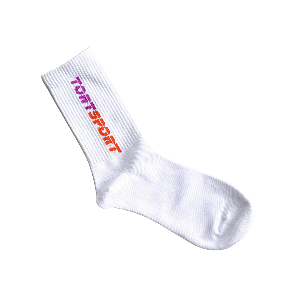 Making your feet look as cute as your hair...  A classic fit crew sock in white with TORTSPORT logo on both sides.   Colour: White Unisex  One size 80% cotton, 15% polyester, 5% spandex Machine Washable  Comes in a silver pack with TORTSPORT sticker as shown in the image.