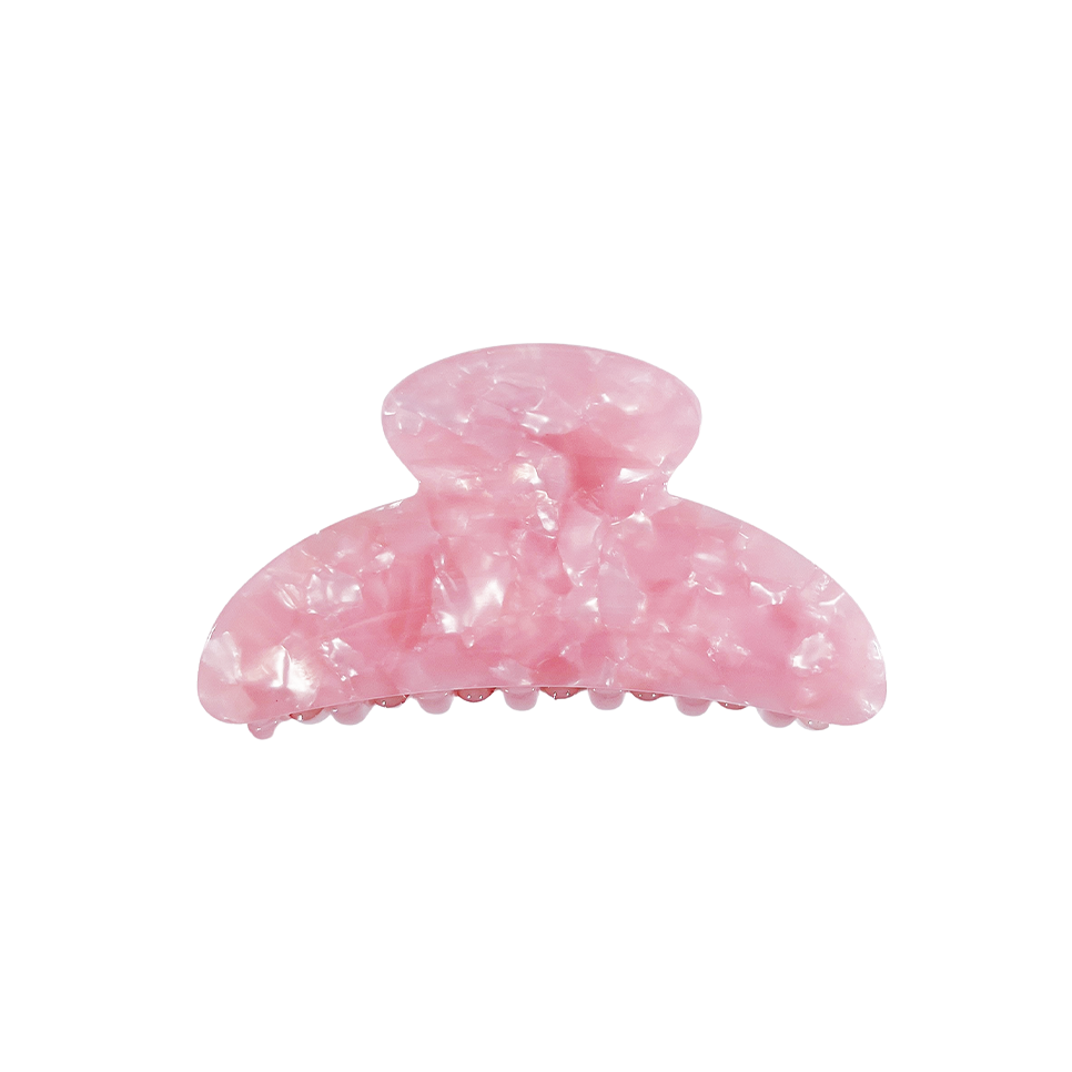 Meet TOTO!  One of our strongest clips in a classic curved top claw shape. Don’t let the small size fool you, as one of our strongest hair claws it works hard to hold all hair, even that difficult fine hair that slips out of clips.  Each clip comes in a branded Tort pouch (colours change seasonally).  Size: 7.5cm  Colour: pearlescent blush pink  Material: eco-resin