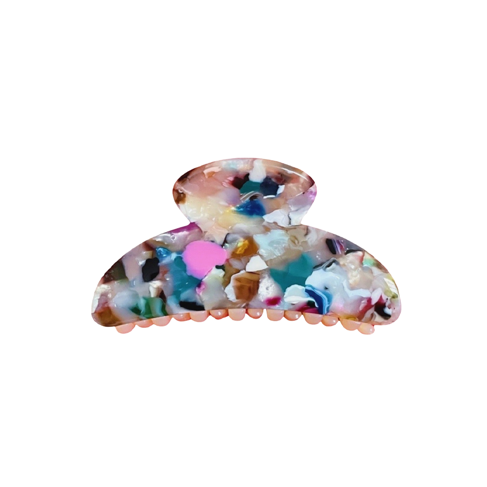 Meet TOTO!  One of our strongest clips in a classic curved top claw shape. Don’t let the small size fool you, as one of our strongest hair claws it works hard to hold all hair, even that difficult fine hair that slips out of clips.  Each clip comes in a branded Tort pouch (colours change seasonally).  Size: 7.5cm  Colour: multicolour marble effect  Material: eco-resin