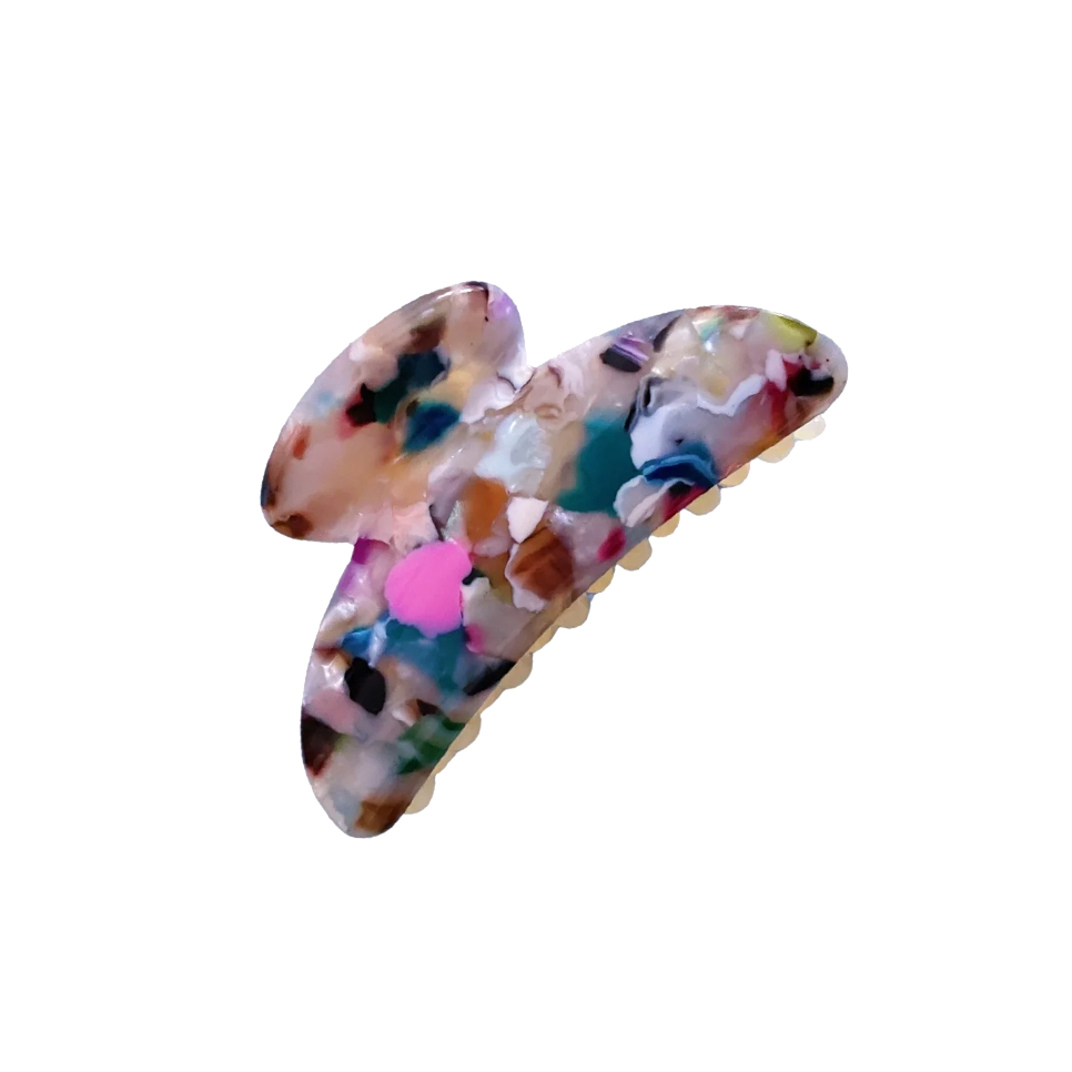 Meet TOTO!  One of our strongest clips in a classic curved top claw shape. Don’t let the small size fool you, as one of our strongest hair claws it works hard to hold all hair, even that difficult fine hair that slips out of clips.  Each clip comes in a branded Tort pouch (colours change seasonally).  Size: 7.5cm  Colour: multicolour marble effect  Material: eco-resin