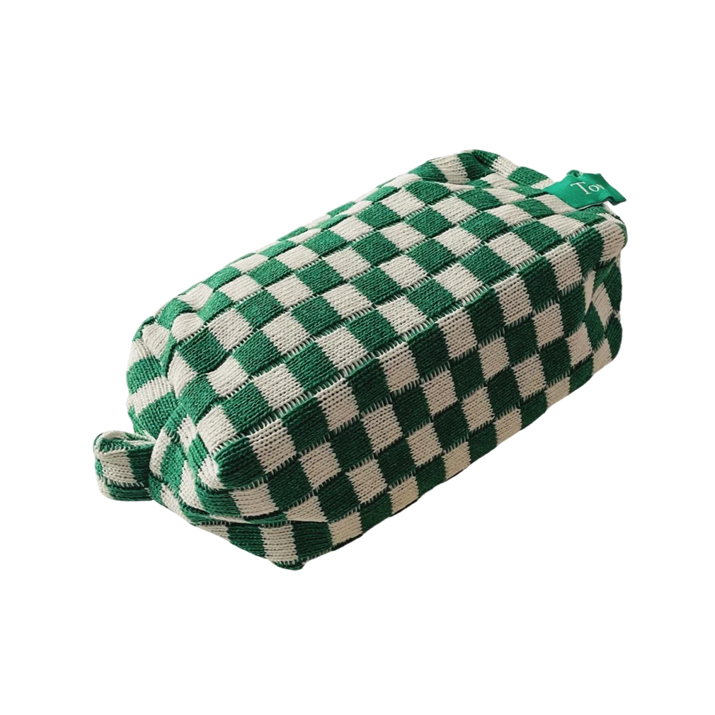 Meet the limited edition Tort Green Checkerboard Wash Bag  A woven green and white checkerboard wash bag, perfect for storing your favourite Tort pieces, makeup, toiletries or handbag essentials. The nylon lining makes it practical and easy to clean.  Size: 21cm x 10cm x 7cm  Colour: green and white checkerboard 