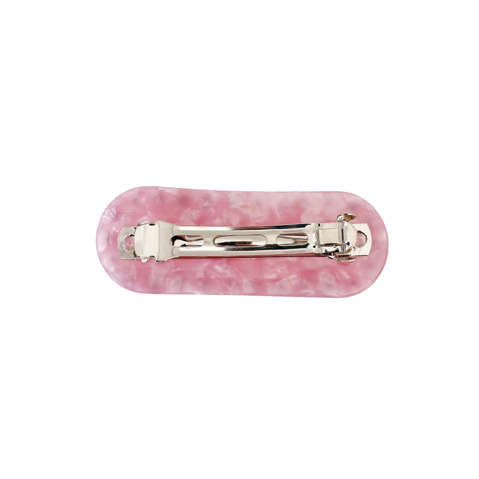Meet ZADI!  A round edged rectangular hair clips with with jewelled detailing and French barrette clasp. Clips to the hair securely and holds well. We recommend using it as a feature clip at the back of the hair above a ponytail or to secure a half up look.  Each clip comes in a branded Tort pouch (colours change seasonally).  Size: 7cm  Colour: blush pink with silver crystal accents  Material: eco-resin 