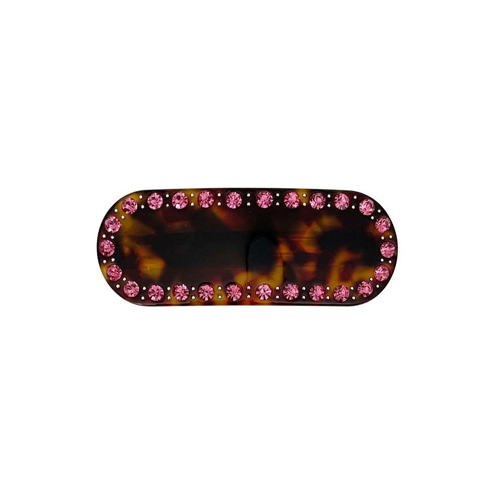Meet ZADI!  A round edged rectangular hair clips with with jewelled detailing and French barrette clasp. Clips to the hair securely and holds well. We recommend using it as a feature clip at the back of the hair above a ponytail or to secure a half up look.  Each clip comes in a branded Tort pouch (colours change seasonally).  Size: 7cm  Colour: brown tortoiseshell with pink crystal accents  Material: eco-resin 
